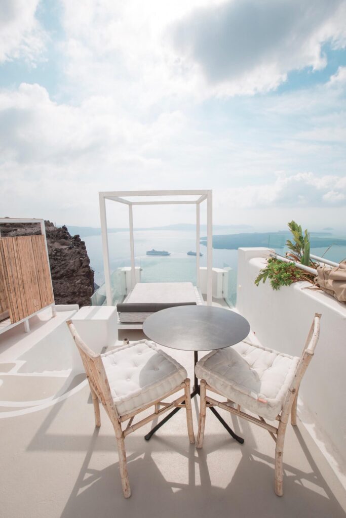 The current image has no alternative text. The file name is: chairs-and-table-for-two-outside-a-resort-in-greec-VLUSB2G.jpg